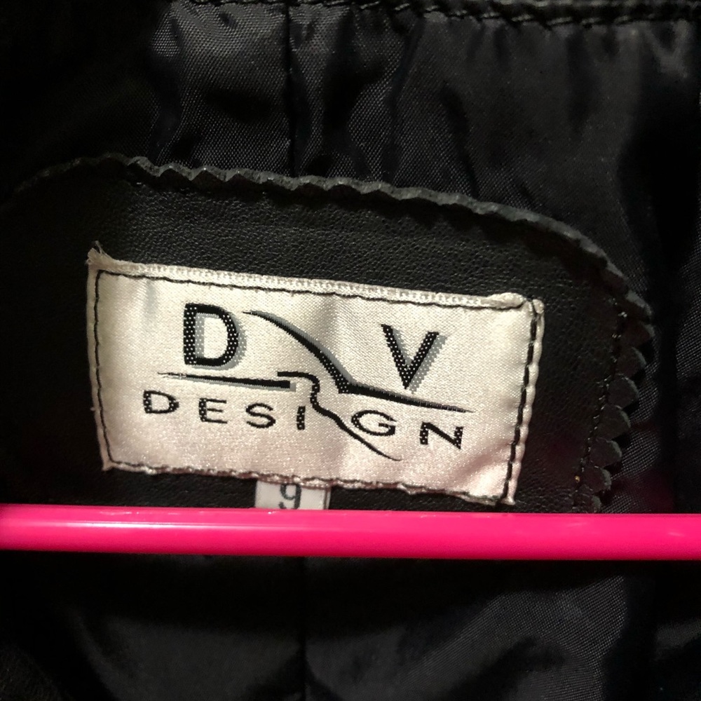 Black genuine leather Jacket.